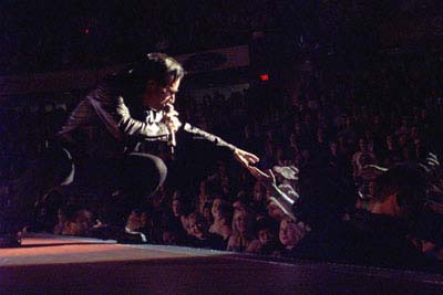 Bono reaches out to the fans during U2's concert Monday, April 9 at the Saddledome (Darren Makowichuk, Calgary Sun).