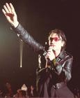 Bono creates some drama during U2's Saddledome show (Darren Makowichuk, Calgary Sun).