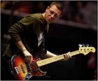  U2's Adam Clayton plays bass at the Elevation tour's stop in Anaheim. (photo FRANCINE ORR / Los Angeles Times)