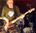 U2's bassist Adam Clayton plays 
