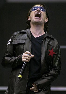 Bono performs onstage during U2's first of two sold-out performances in Toronto Thursday May 24, 2001; Photo: CP PHOTO/Aaron Harris <br />