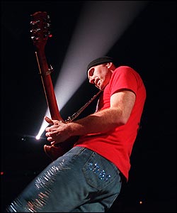 On lead guitar and backing vocals, The Edge. Pictured here at the June 5 Boston opener. (Evan Richman / Globe Staff Photo)