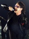 U2 lead singer Bono performs during a concert in Barcelona on August 8, 2001. The Irish band is touring Spain during their 