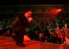 Bono, lead singer of the Irish rock group U2, kicks off the band's world tour 