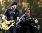 U2 guitarist The Edge, left, and lead singer Bono perform during during the first concert of their Vertigo Tour at the San Diego Sports Arena Monday, March 28, 2005. (AP Photo/Denis Poroy)