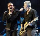 Bono, left, and Adam Clayton of U2 perform in Los Angeles, Tuesday, April 5, 2005. (AP Photo/Chris Pizzello)