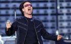 Bono, the lead singer for Irish rock band U2, performs during their concert at King Baudouin Stadium in Brussels, Friday June 10, 2005. U2 on Friday kicked of the first leg of their European 'Vertigo' tour in Brussels. (AP Photo/Geert Vanden Wijngaert)
