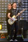 Bono (L), lead singer of Irish rock band U2, and guitarist The Edge perform during a concert at the King Baudouin Stadium in Brussels June 10, 2005. U2 is currently on their 'Vertigo 2005' world tour with Brussels as the first concert in Europe. REUTERS/Str