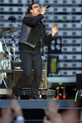 Bono, the lead singer for Irish rock band U2, performs at the King Baudouin Stadium in Brussels, Friday June 10, 2005. U2 on Friday kicked of the first leg of their European 'Vertigo' tour in Brussels. (AP Photo/Geert Vanden Wijngaert)