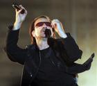 Bono, singer of Irish rock band U2, performs in front of 60,000 fans at the Arena AufSchalke in Gelsenkirchen, western Germany, Sunday, June 12, 2005. The concert is their first in Germany and the second in Europe of U2's Vertigo tour. (AP Photo/Martin Meissner)