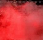 Lead singer Bono of Irish rock band U2 performs during a concert at the City of Manchester Stadium, northern England, June 14, 2005. U2 are currently on their 'Vertigo 2005' world tour. REUTERS/Darren Staples