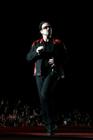 Irish singer Bono of the band U2 perfoms during a concert at the Olympic Stadium in Rome July 23, 2005. The band is in Italy as part of their 'Vertigo 2005' world tour. REUTERS/Alessia Pierdomenico