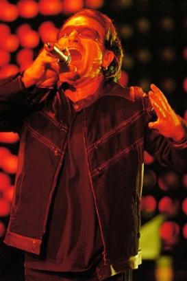 U2's Bono performs during the band's concert in Toronto, Monday, Sept. 12, 2005. (AP PHOTO/CP, Aaron Harris)