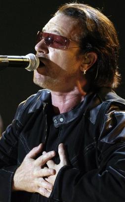U2's Bono performs during the band's concert in Toronto, Monday Sept. 12, 2005. (AP Photo/Aaron Harris, CP)
