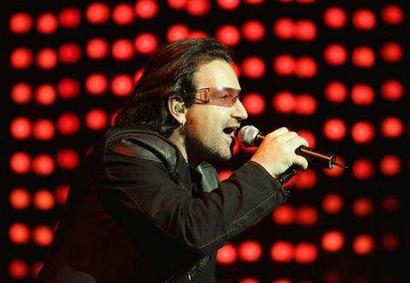 Irish rock band U2's lead singer Bono performs during their concert in New York, October 7, 2005. REUTERS/Gary Hershorn