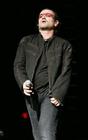U2's lead singer Bono performs during the Vertigo Tour at Madison Square Garden in New York, Monday, Nov. 21, 2005. (AP Photo/Jeff Christensen)