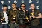 The Irish rock group U2, (L-R) The Edge,Adam Clayton, Bono and Larry Mullen, pose after winning five Grammy Awards, including Record of the Year for 