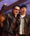 Bono, left, and The Edge, of U2 accept the award for best rock performance by a duo or group for 