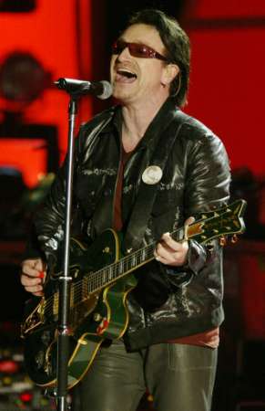 Bono sings the song "Walk On" as U2 performs the opening song at the 44th Annual Grammy Awards in Los Angeles February 27, 2002. "Walk On" won the Grammy Award for Record of the Year. REUTERS/Gary Hershorn