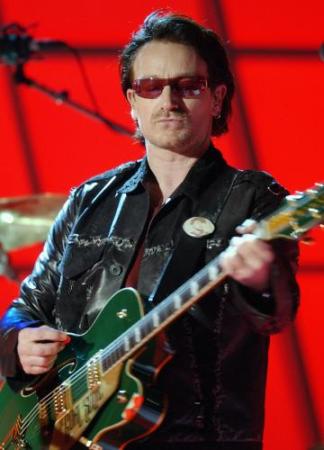 Bono performs with U2 during the 44th annual Grammy Awards, Wednesday, Feb. 27, 2002, in Los Angeles. (AP Photo/Kevork Djansezian)