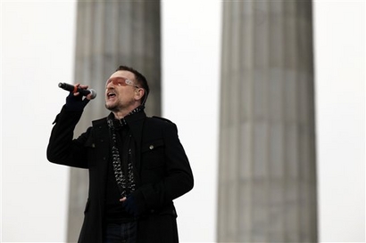 U2 frontman Bono sings at the Lincoln Memorial during President-elect Barack Obama's inaugural concert in Washington, Sunday, Jan. 18, 2009. (AP Photo/Charles Dharapak)