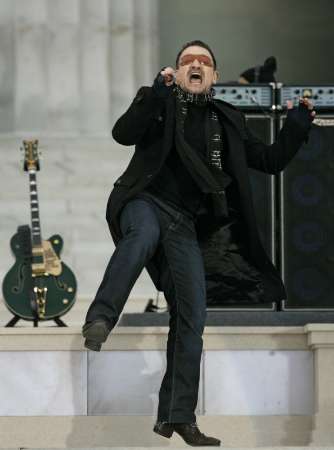 Bono of U2 performs 'In the Name of Love' during the We Are One: Inaugural Celebration at the Lincoln Memorial in Washington January 18, 2009. REUTERS/Jason Reed (UNITED STATES)
