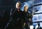Lead singer Bono of the band U2 performs at the 51st annual Grammy Awards in Los Angeles February 8, 2009. (Lucy Nicholson/Reuters)