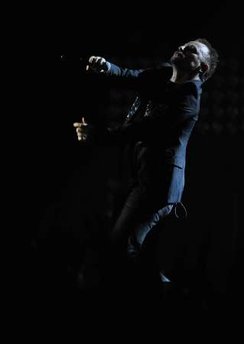 Bono from U2 performs at the Brit Awards at Earls Court in London February 18, 2009. REUTERS/Dylan Martinez (BRITAIN)